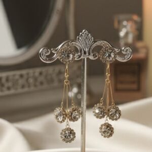 Gold toned tassel rhinestone earrings